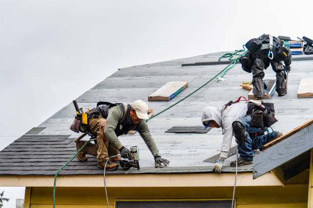 Professional Gutter Installation technician working in Huron, CA